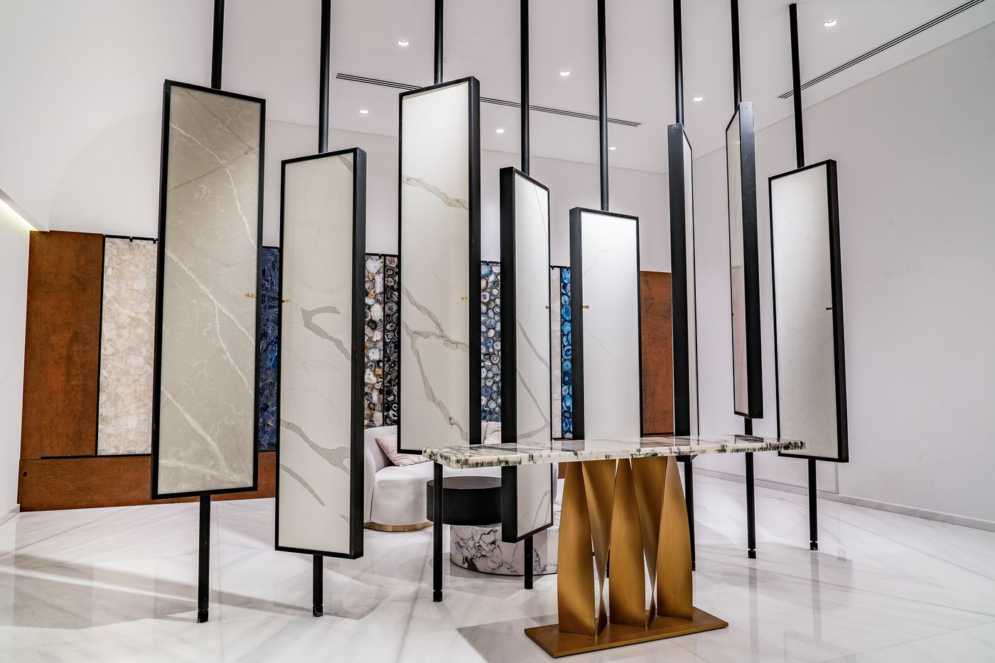 Engineered quartz sample panels on freestanding display frames